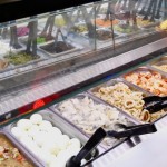 View of Sultan's Market salad bar with eggs, chicken, shrimp and a plethora of other salad items.